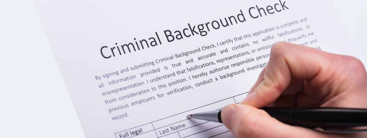 Person completing a criminal background check - if you need assistance contact Andrea Henning Law